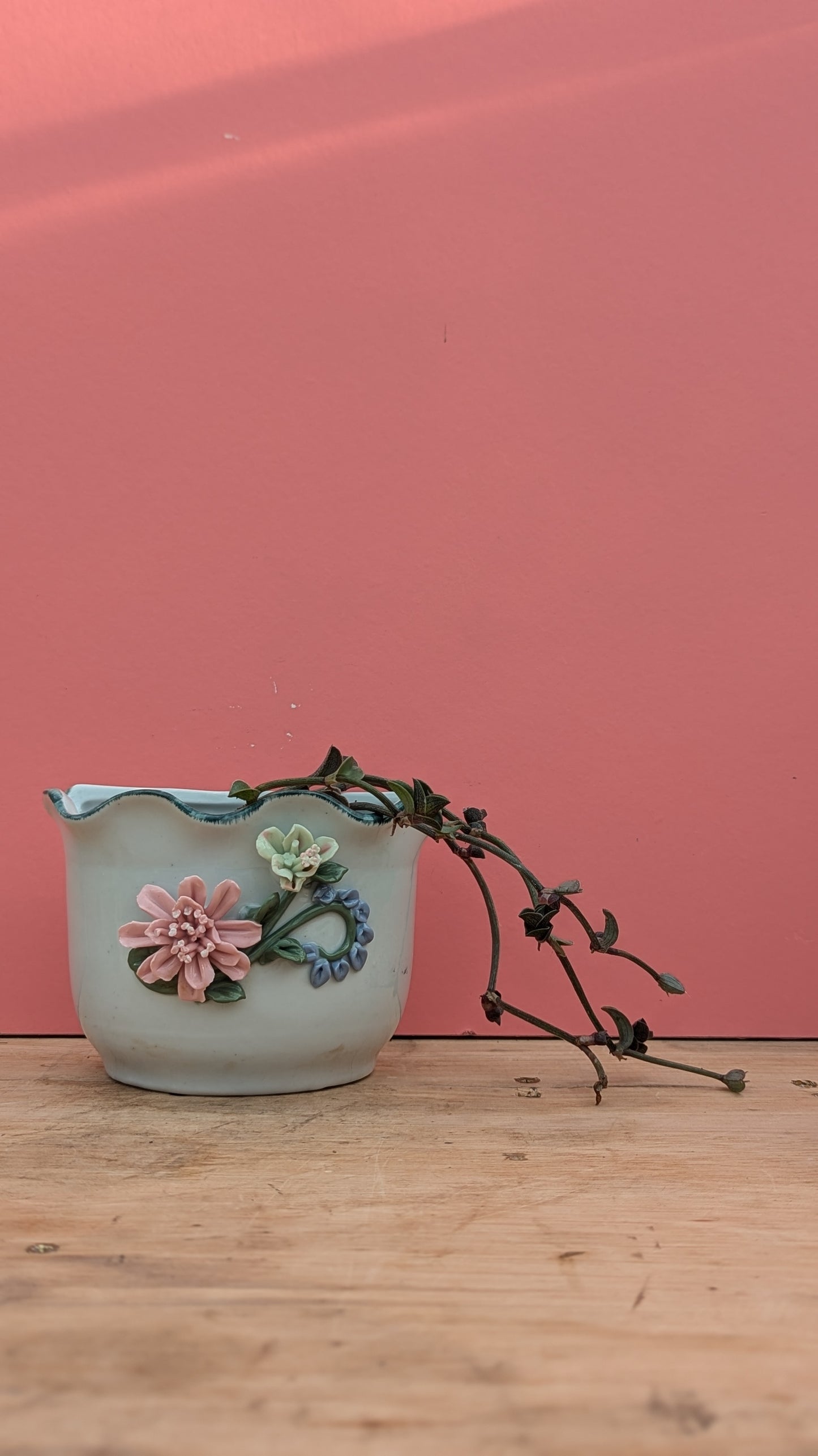 White ceramic wall hanging pot